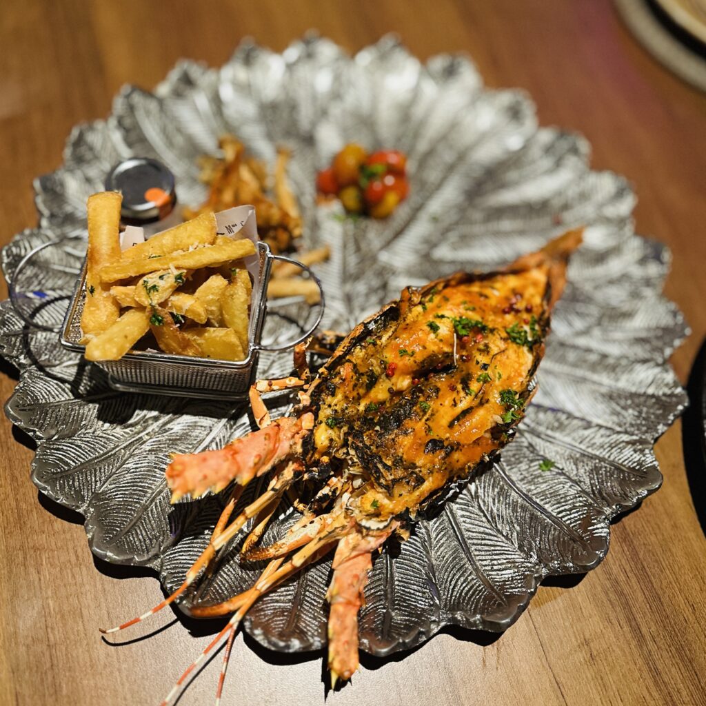 This image is of Phuket Lobster with frites prepared by Kalido Phuket | Followfauzia.com