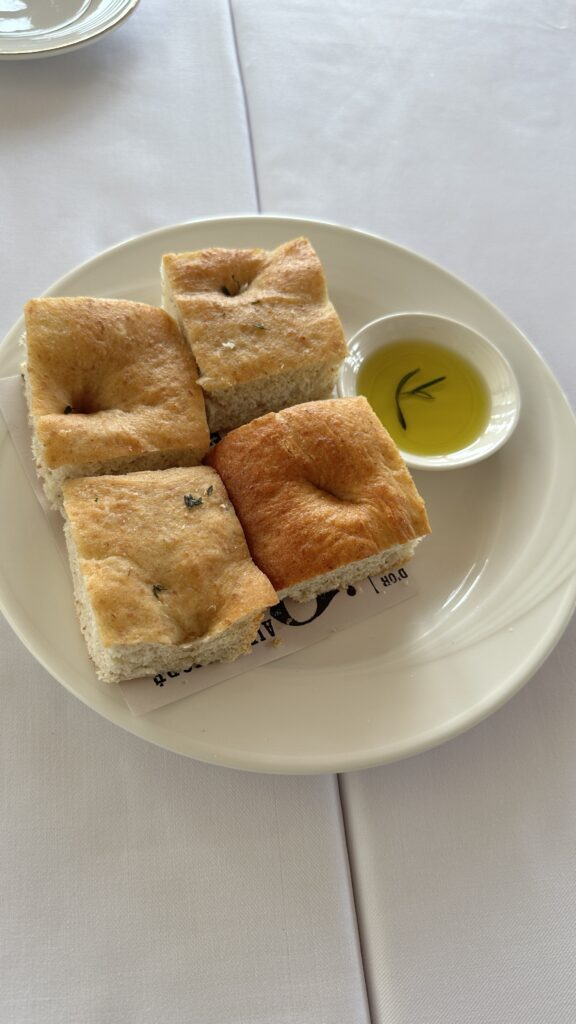 This image is of Foccia bread and Olive Oil prepared by Catch Beach Club Phuket | Followfauzia.com
